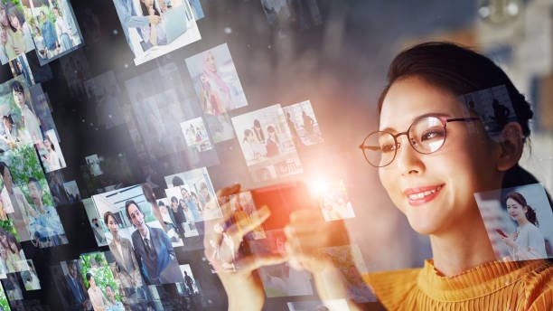 Communication network concept. Young asian woman in the office. Social networking service. Streaming video.